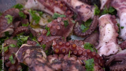 Marinated octopus tentacles ready for barbecue 
