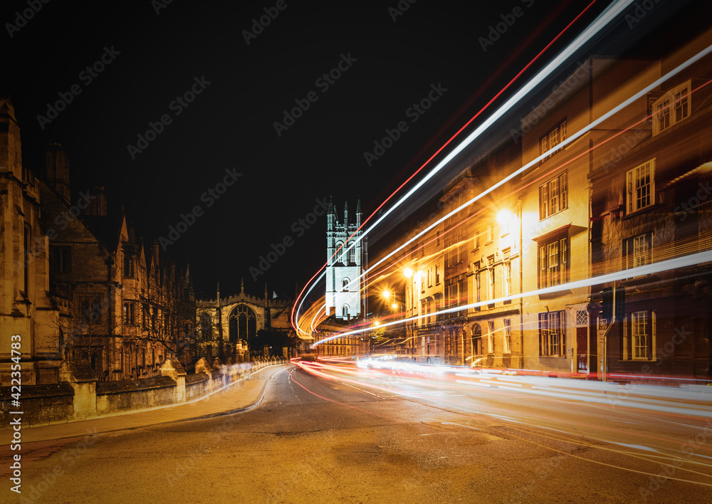 Traffic Light Trails Past Oxford University Buildings Along High Street