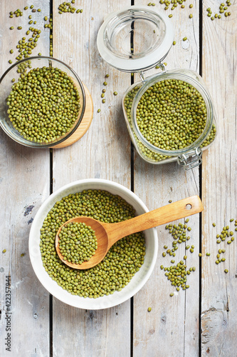 Raw mung beans in a bowl.