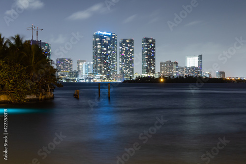 city skyline at night, miami florida, long exposure, smooth water
