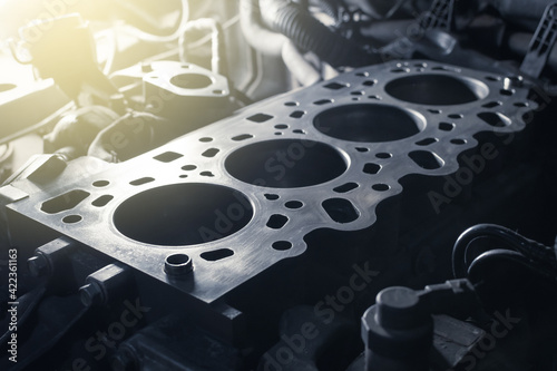 Disassembled car engine without cylinder head. Repair of an old turbocharged diesel engine in a car workshop. Close up. photo