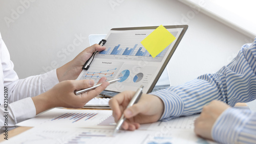 Businessman is negotiating on investment to expand the market and suggest ways to increase income for young investors, Business Chat and Marketing Team Meetings.