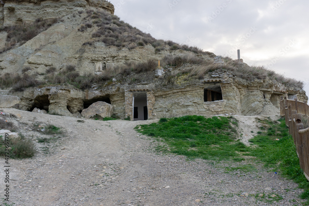 view of the caves of Arguedas and the homes in the sandstone cliffs
