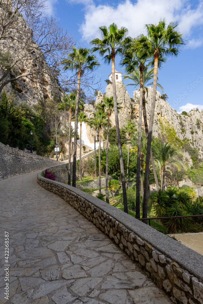 stone pedestrian path leading to the old town center of Guadalest