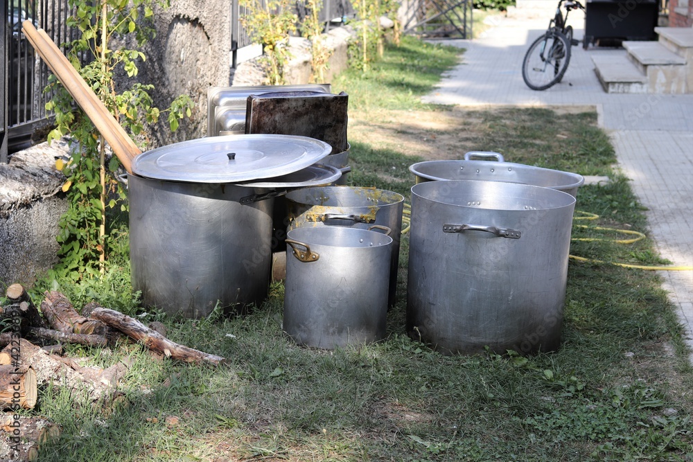 Big Cooking Pans on the Grass after the Village Feast, Central Italy