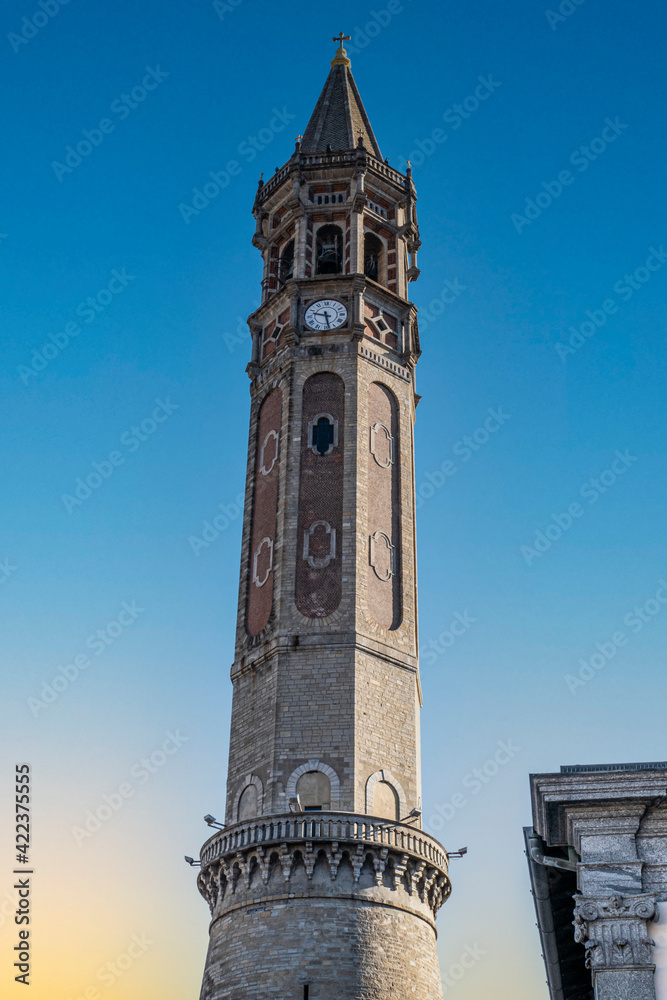 The famous pastel-shaped bell tower of Lecco at sunset