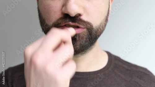 Closeup to man enjoy eating.