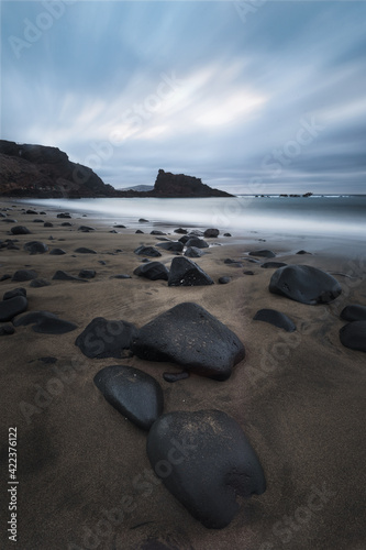 Amanecer nuboso en la playa del Burrero, Gran Canaria photo