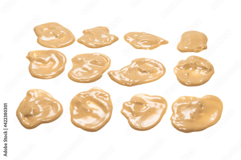 Mushroom sauce splashes isolated on white background. Mushroom sauce splashes isolated on white background.