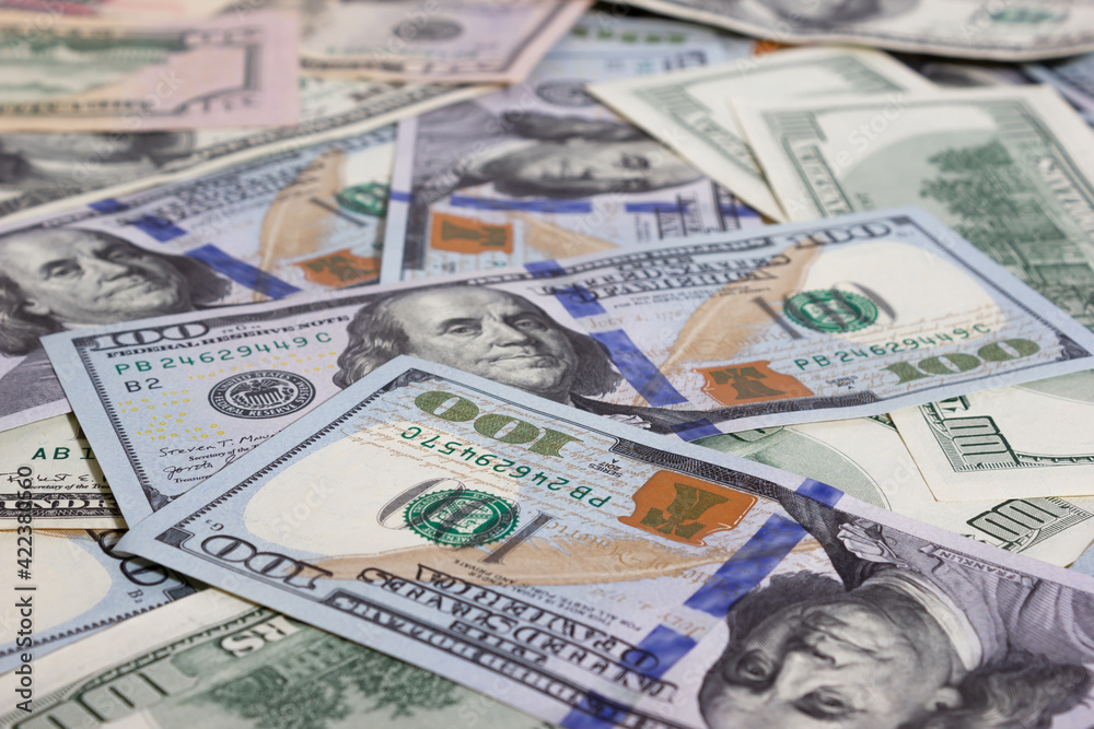 Bundle of dollars on the table close-up - texture, background Bundle of dollars on the table close-up - texture, background