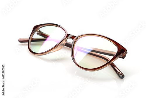 Glasses in a plastic frame, with transparent glasses, on a light background
