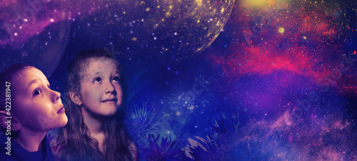 Childhood and dream concept. Conceptual image with girl and boy dreaming about space, stars, planets.