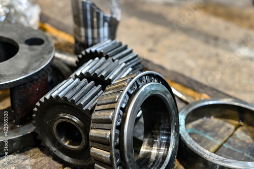 Gears on a rack with a large bearing. Repair of mechanical equipment.