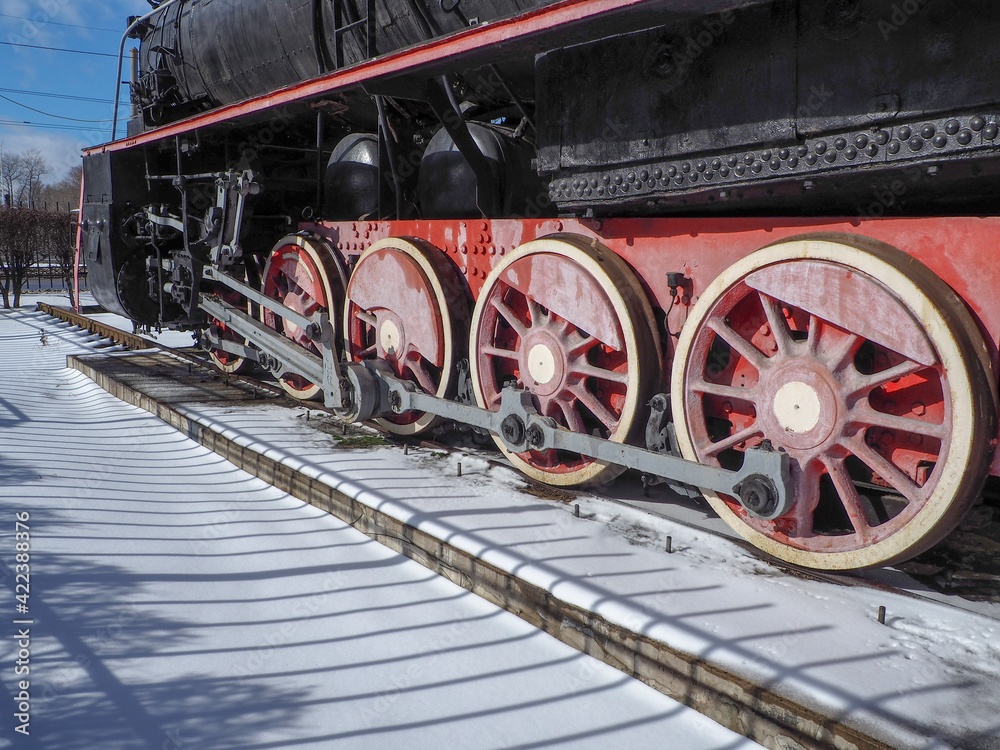 red wheels of a retro steam locomotive