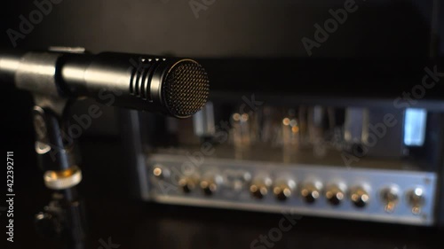 preparing the guitar and amp for operation . Music equipment