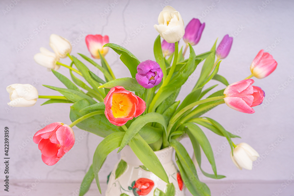 Bouquet of flowers. Tulips close-up. Various colors. Postcard, there is a place for text. Background, texture. Spring and beauty, congratulations Bouquet of flowers. Tulips close-up. Various colors. Postcard, there is a place for text. Background, texture. Spring and beauty, congratulations