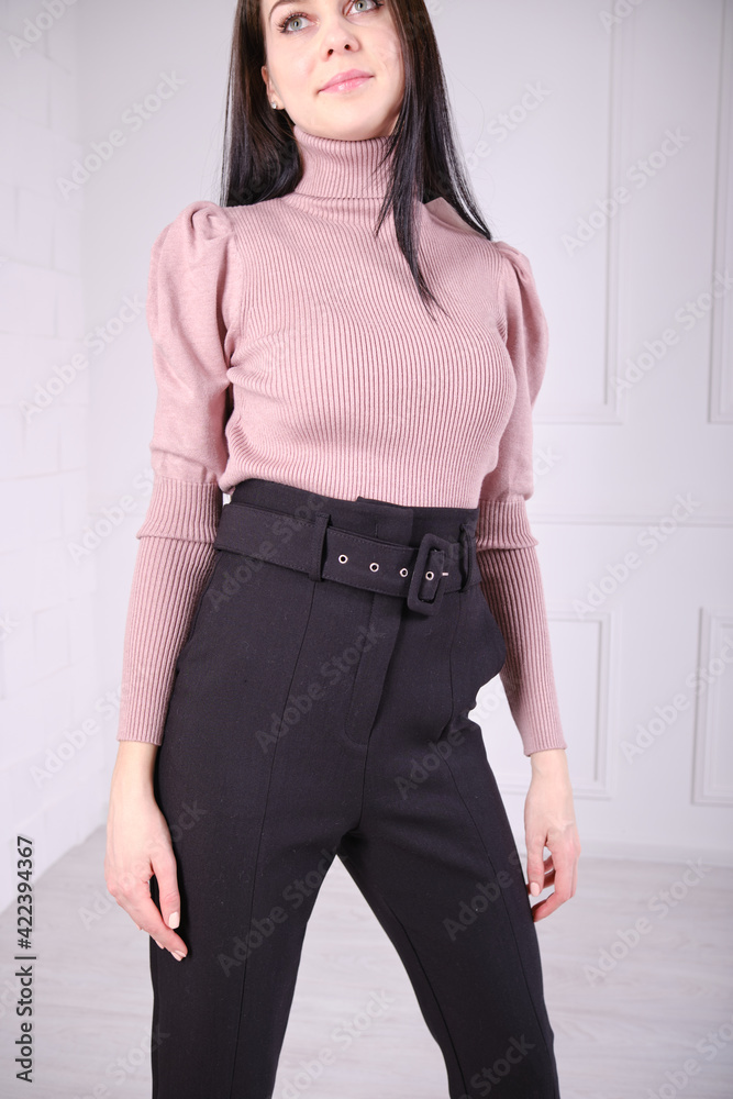 Young beautiful girl show clothes for an online store. Bright clothes. Young beautiful girl show clothes for an online store. Bright clothes.