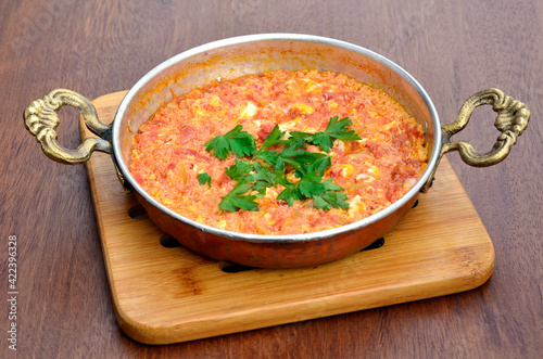 eggs tomatoes green pepper in pan