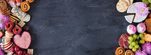 Panel kuchenny z motywem Mother's Day charcuterie double border against a dark slate banner background. Assorted cheese, meat, fruit and sweet appetizers. Copy space.