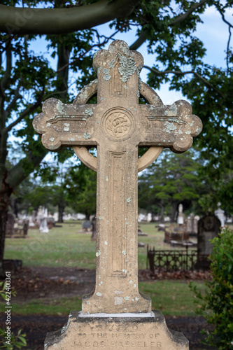 Carved stone cross on grave