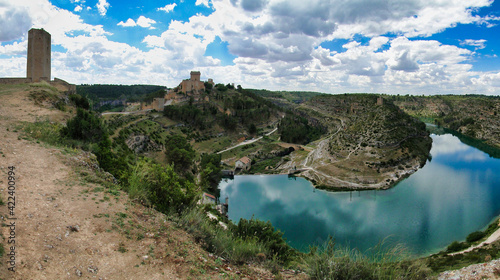 Villa medieval de Alarcón, España, con su castillo sus torres de vigilancia extramuros y el meandor sobre el río Júcar photo