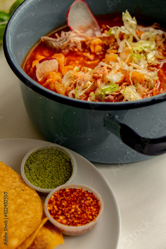 Mexican Pozole with peper, oregano and tostadas