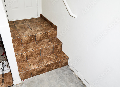 New Tile Installation on steps with a Landing