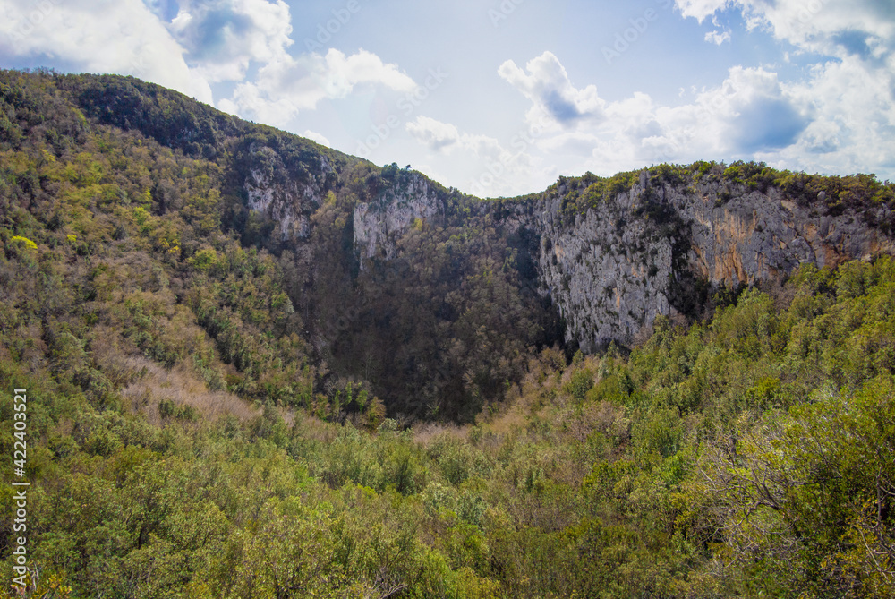 Revotano and Eremo di San Leonardo (Roccantica, Italy) - The spectacular attractions in Sabina mountain: the surreal green karst sinkhole named Revotano and the ruins of old hermitage of Saint Leonard