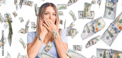 Fotografie Young beautiful blonde woman wearing casual clothes shocked covering mouth with hands for mistake