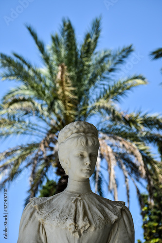 palm tree with sculpture