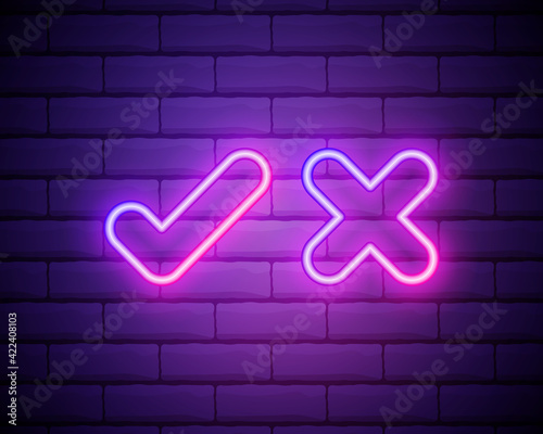 Neon check mark and cross on brick wall. Pink tick and decline symbol isolated on brick wall. Accept and reject. Right and wrong. Bright neon design for games, app, web page. Vector illustration.