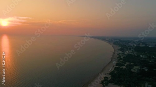 Sunset on the black sea coast view from a drone on the beach of the city of anapa