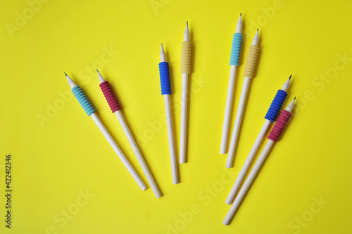pencils with a soft colored pad for correct writing. the concept of preparing for school and studying