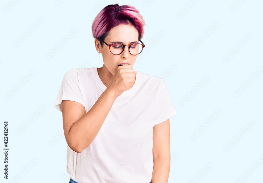 Young beautiful woman with pink hair wearing casual clothes and glasses feeling unwell and coughing as symptom for cold or bronchitis. health care concept.