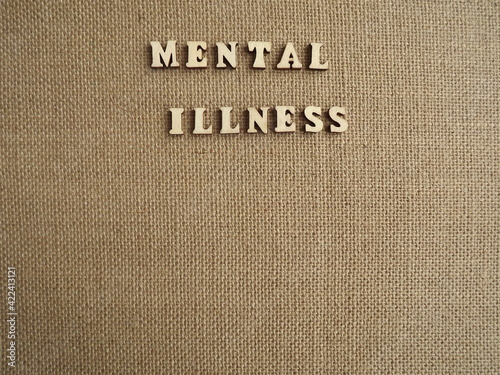 mental illness wooden letters and figurines of men and women. High quality photo