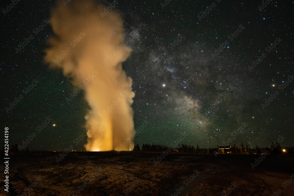 USA, Wyoming, Yellowstone National Park. Milky Way over an erupting Old Faithful Geyser in Yellowstone NP, Wyoming