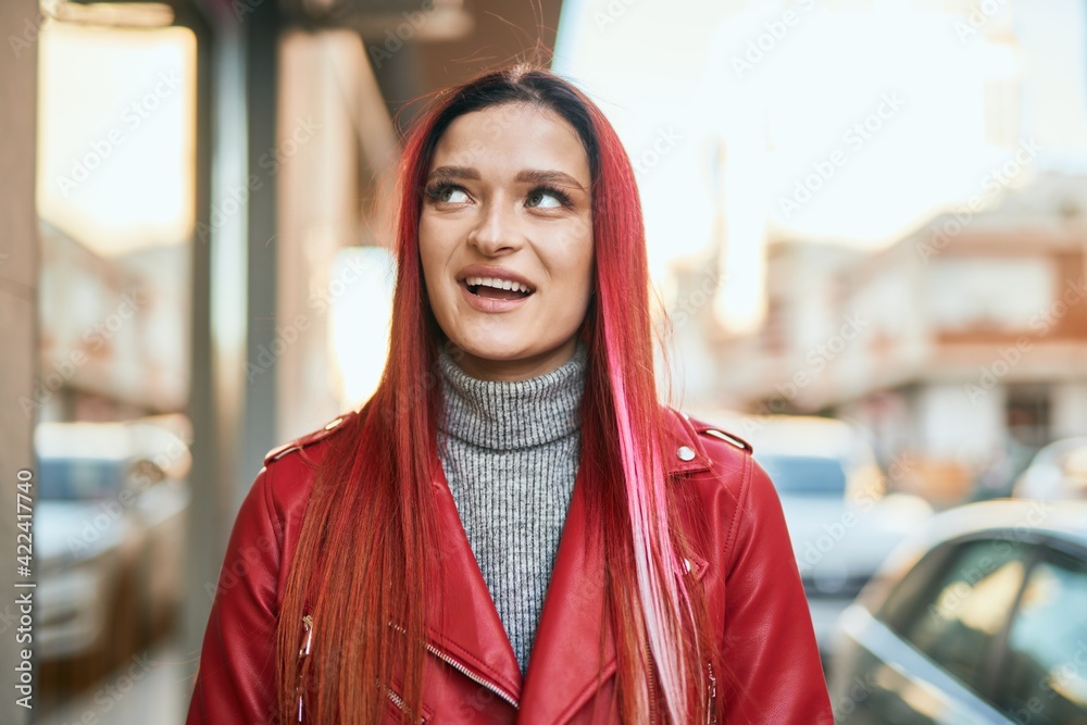 Young caucasian girl smiling happy standing at the city. Young caucasian girl smiling happy standing at the city.