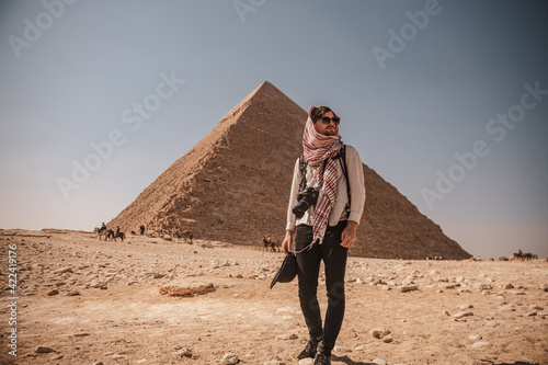 Man in the desert near the Giza Pyramids