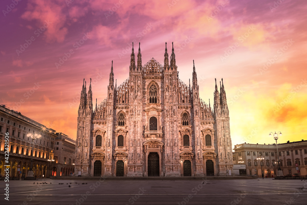 Milan Cathedral (Duomo di Milano) at sunrise, with red and orange sky during lockdown (red zone), empty square with no people - obrazy, fototapety, plakaty 