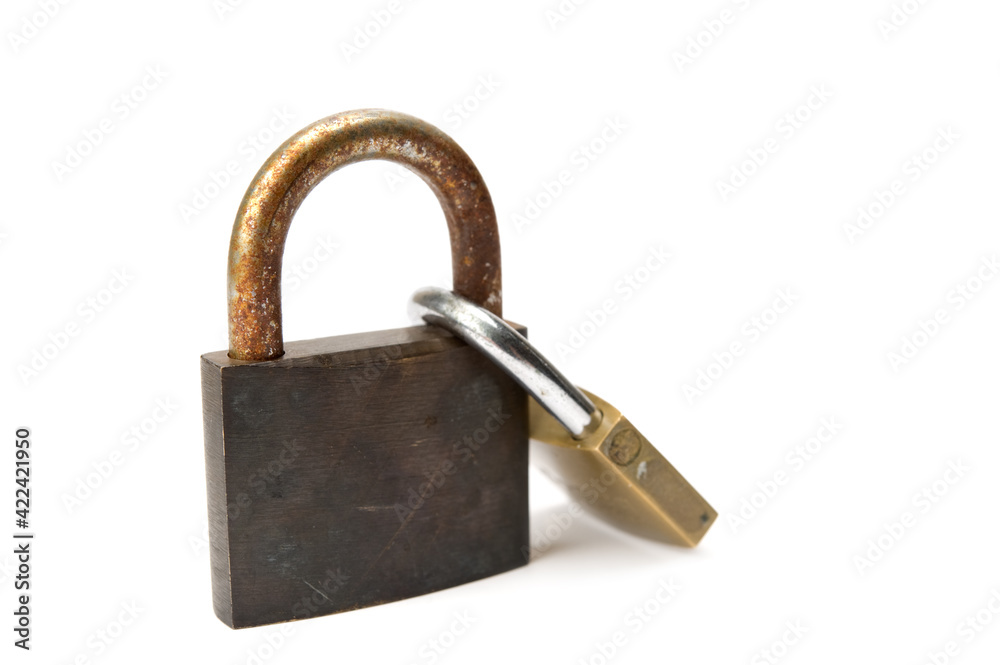 Closed padlocks together on white background Closed padlocks together on white background