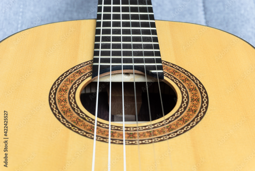 Close up of handmade classical guitar Close up of handmade classical guitar
