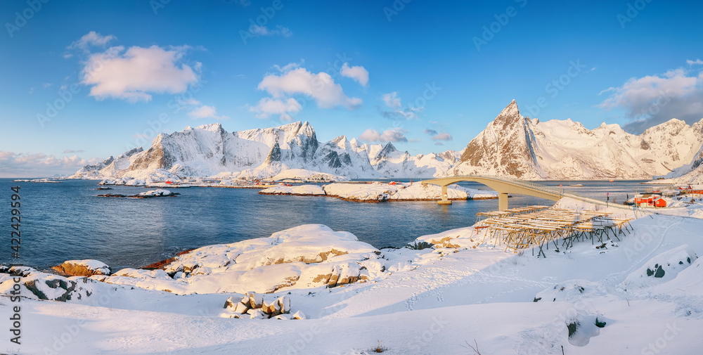 Stunning winter view on  Reine, Sakrisoya and Hamnoy villages  and bridge to Olenilsoya island .