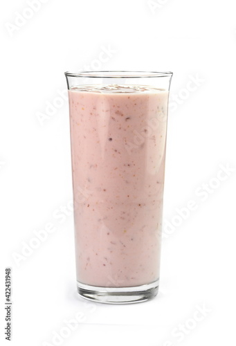 Glass of pink strawberry milkshake or cocktail isolated on white background. 