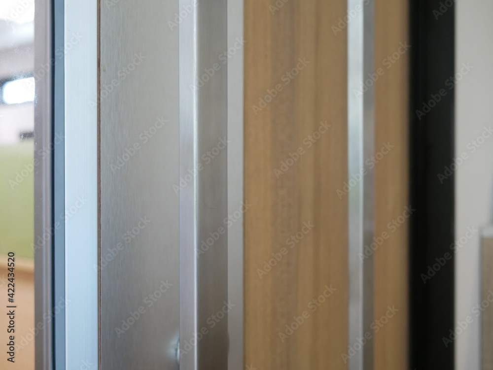closeup of metal handle door in office. closeup of metal handle door in office.