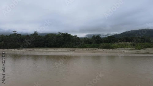 Aerial tour of the Zamora River on a cloudy day, located in the south of the Ecuadorian Amazon