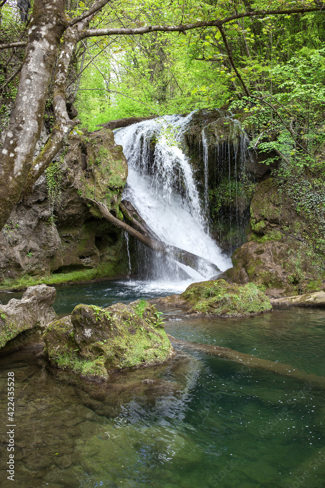 Fototapeta premium Close up of vaioaga waterfall with crystal clear water.