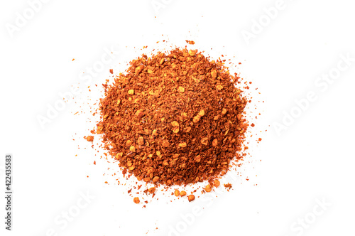  Dry red spicy pepper powder
 isolated on white background. Top view