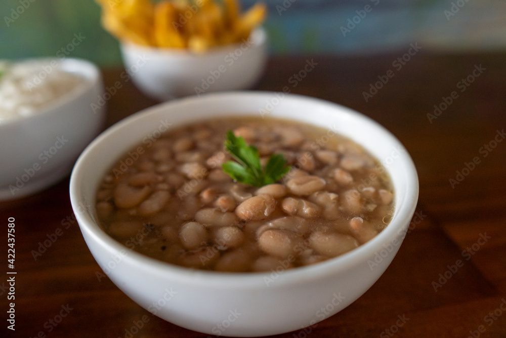 Bowl of beans, brazilian food. Brown Bowl of beans, brazilian food. Brown