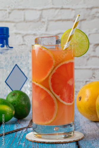 Greyhound cocktail in a summer setting