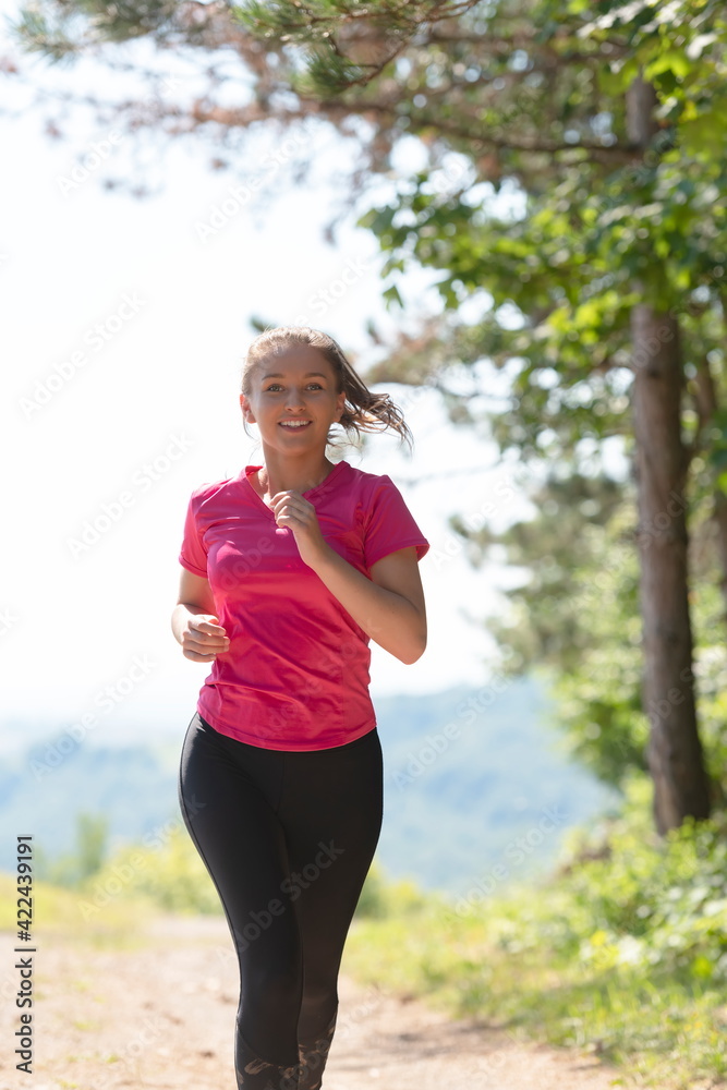 woman enjoying in a healthy lifestyle while jogging